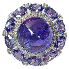 Set in 18k White Gold, Natural Tanzanite Cabochons 
Diamonds Cocktail/Dome Ring