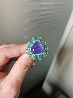 Set in 18K white Gold, Tanzanite Cabochon, Emerald & Diamonds Cocktail Dome Ring