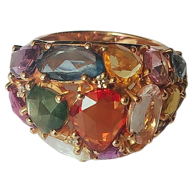 A very gorgeous and one of a kind,  Multi Sapphire Cocktail Ring set in 18K Rose Gold & Diamonds. The weight of the Multi sapphires is  10.16 carats. The Multi Sapphires are of Ceylon (Sri Lanka) origin. The Diamonds weight is 0.13 carats. Net 18K