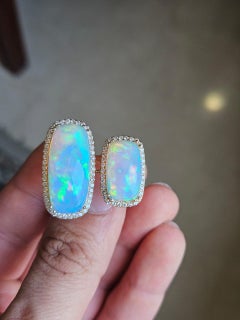 Set in 18K Yellow Gold, 14.04 carats, Ethiopian Opal & Diamonds Cocktail Ring