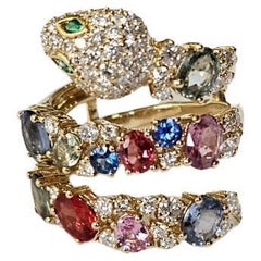 Set in 18K Yellow Gold, Multi Sapphires 
Diamonds "Snake" Engagement Ring