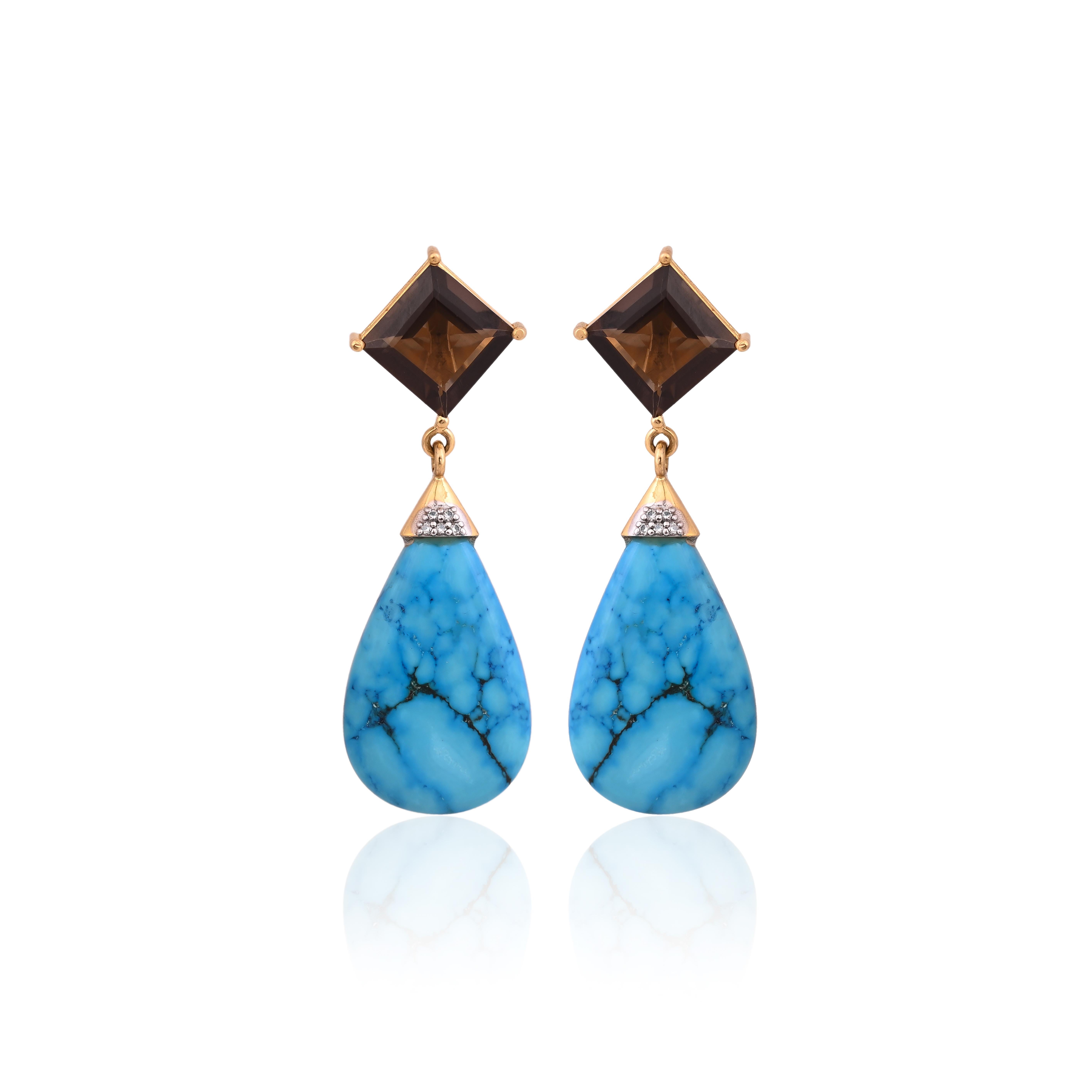 A very gorgeous and beautiful, Smokey Quartz & Turquoise Drop Earrings set in 18K Yellow Gold & Diamonds. The weight of the Smokey Quartz is 7.44 carats. The weight of the Turquoise is 25.70 carats. The Diamonds weight is 0.06 carats. Net 18K Gold