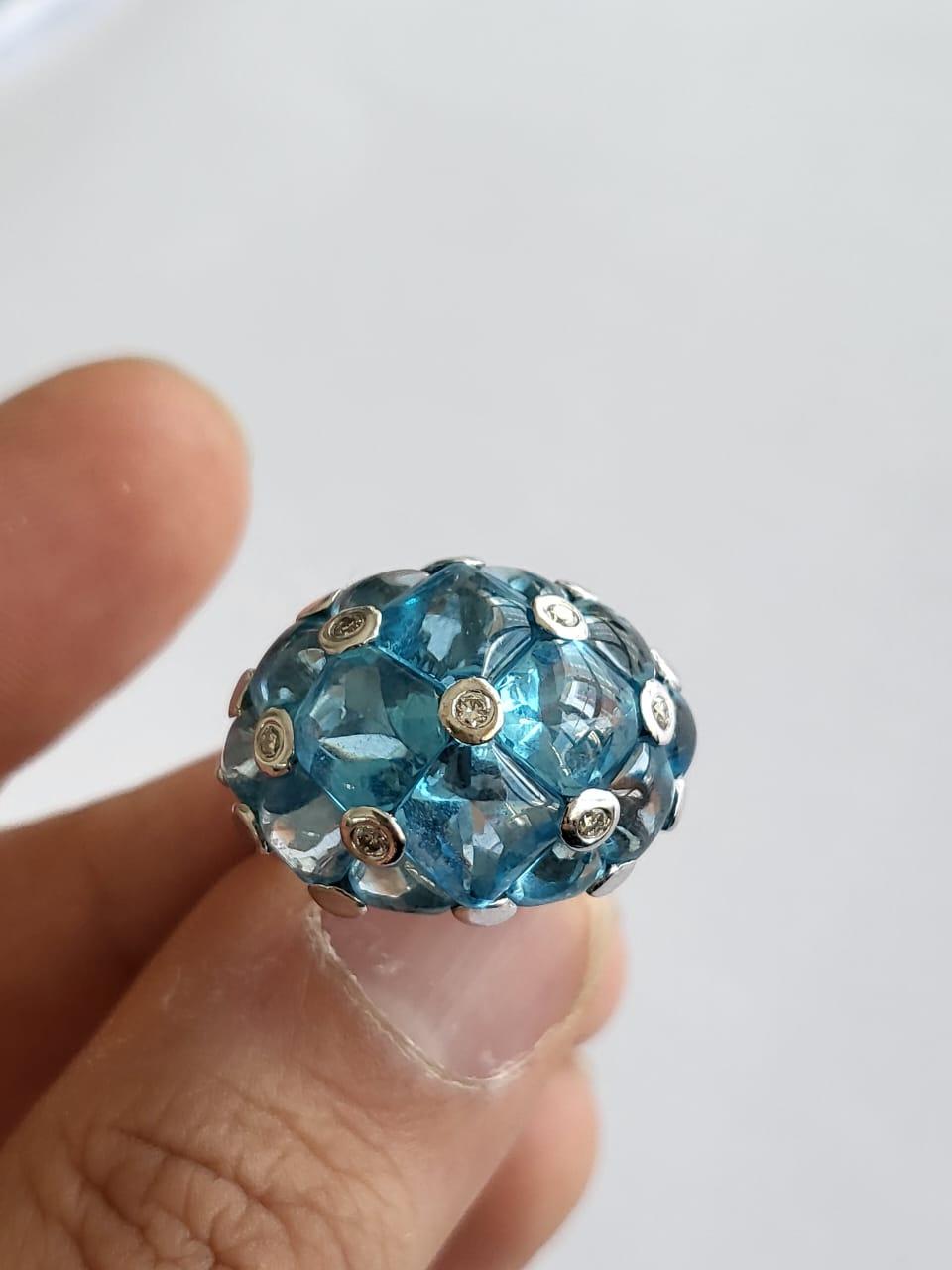 A very gorgeous and beautiful, Aquamarine Dome Cluster Ring set in Platinum 900 and Diamonds. The weight of the Aquamarines in 14.73 carats. The Diamonds weight is 0.13 carats. The dimensions of 1.90cm x 2.00cm x 1.10cm (L x W x D). The ring is made