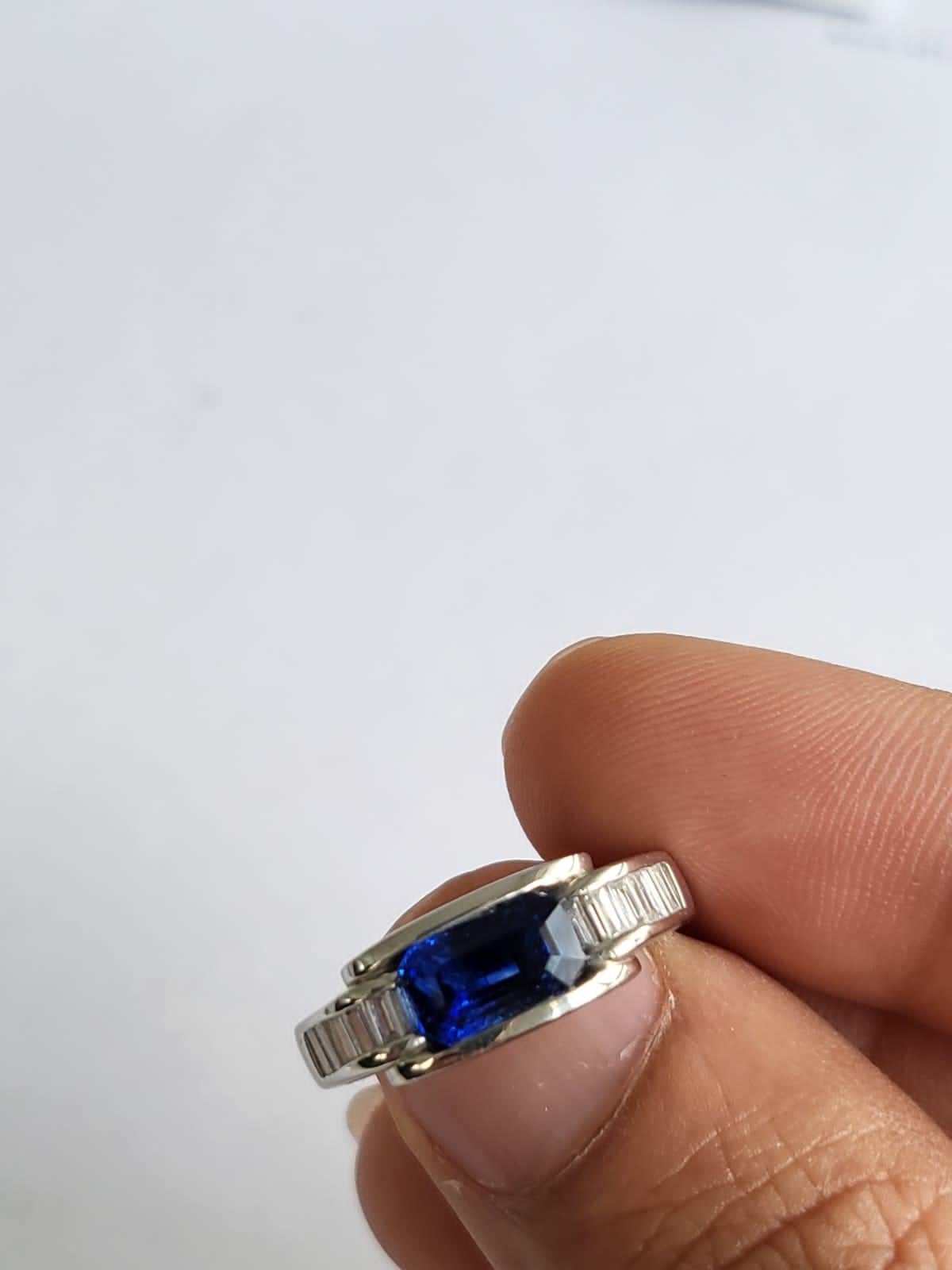 A very beautiful, Blue Sapphire Engagement Ring set in Platinum 900 & Diamonds. The weight of the Blue Sapphire & Diamonds. The weight of the Blue Sapphire is 2.13 carats. The Blue Sapphire is of Ceylon (Sri Lanka) origin. The weight of the Diamonds