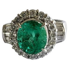 Set in Platinum 900, 3.05 carat Columbian Emerald & Diamonds Engagement Ring