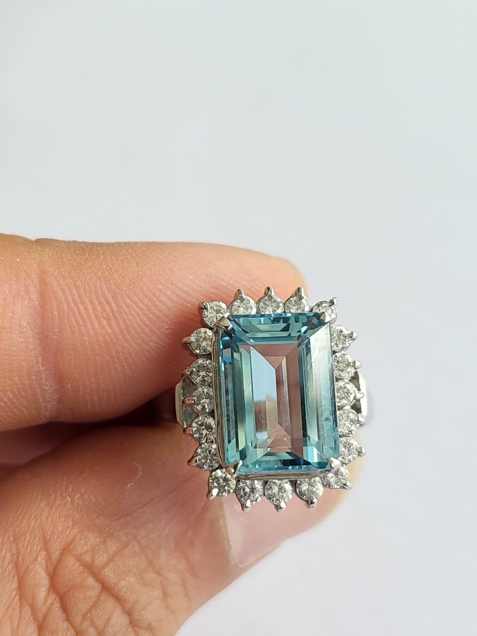 A very gorgeous and classical, Aquamarine Engagement / Wedding Ring set in Platinum 900 & Diamonds. The weight of the Emerald Cut Aquamarine is 4.69 carats. The weight of the Diamonds is 0.69 carats. Net Platinum weight is 7.02 grams. The dimensions