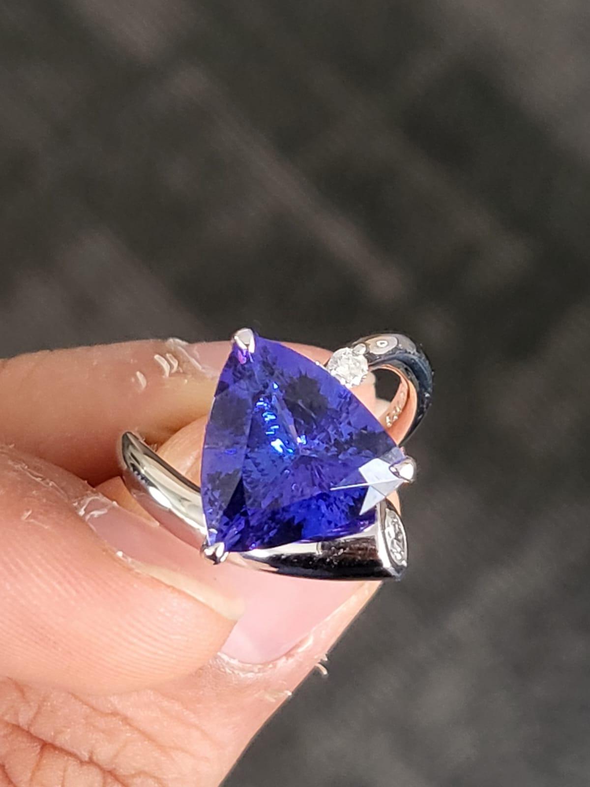 A very beautiful, Tanzanite Engagement Ring set in Platinum 900 & Diamonds. The weight of the Tanzanite is 5.80 carats. The Tanzanite is responsibly sourced from Tanzania. The weight of the Diamonds is 0.33 carats. Net Platinum weight is 8.87 grams.