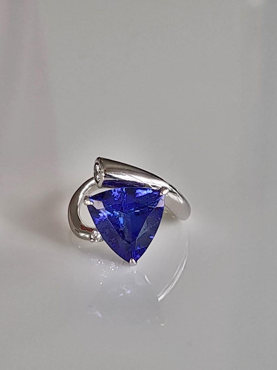 Trillion Cut Set in Platinum 900, 5.80 Carats Tanzanite & Diamonds Engagement Ring For Sale