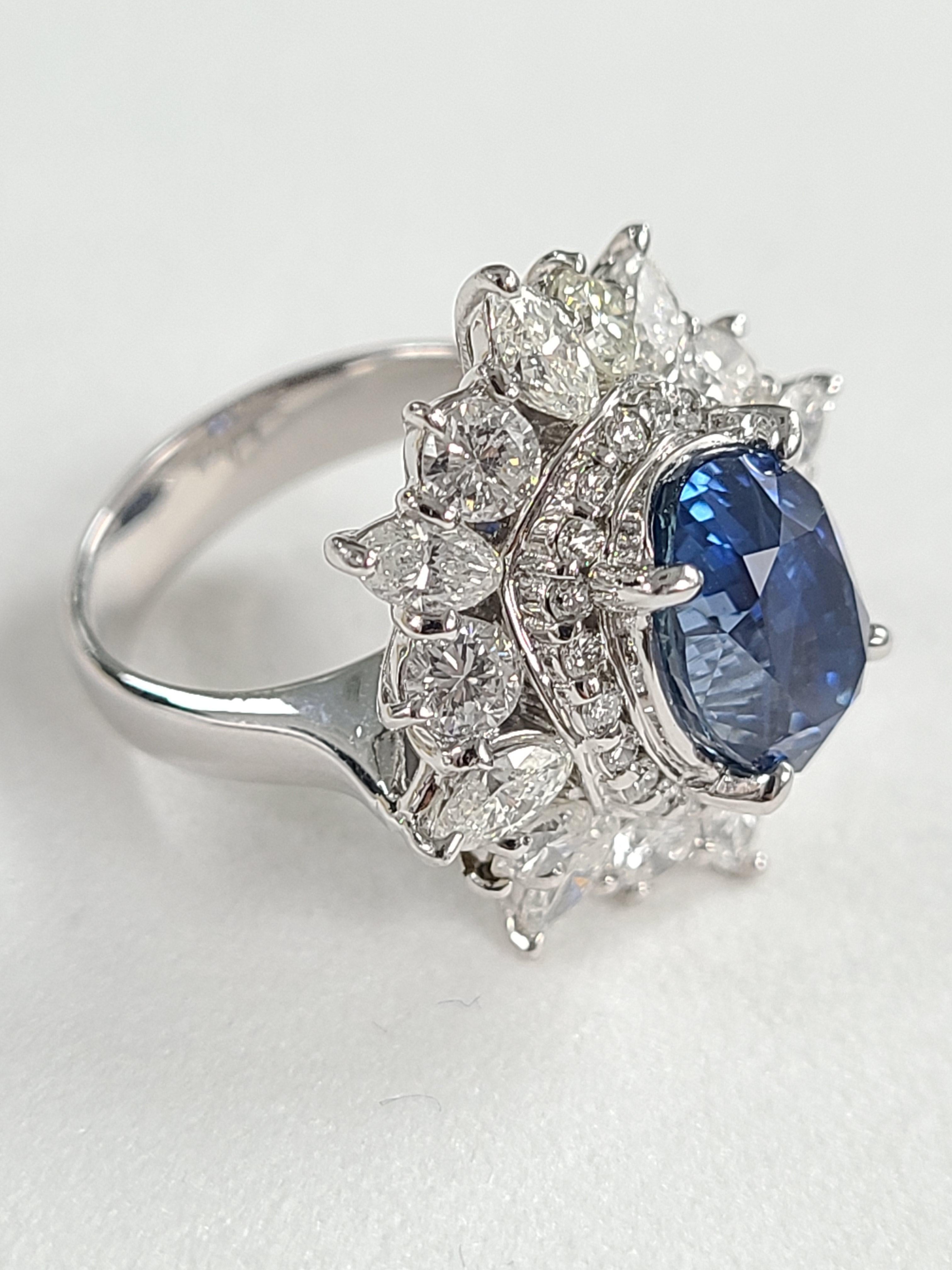 A beautiful and elegant blue sapphire ring set in platinum PT900 with natural diamonds. The blue sapphire weight is 5.973 carats and diamond weight is 2.792 carats . The ring dimensions in cm 2 x 2 x 2.8 (L X W X H). US size 6 1/2.