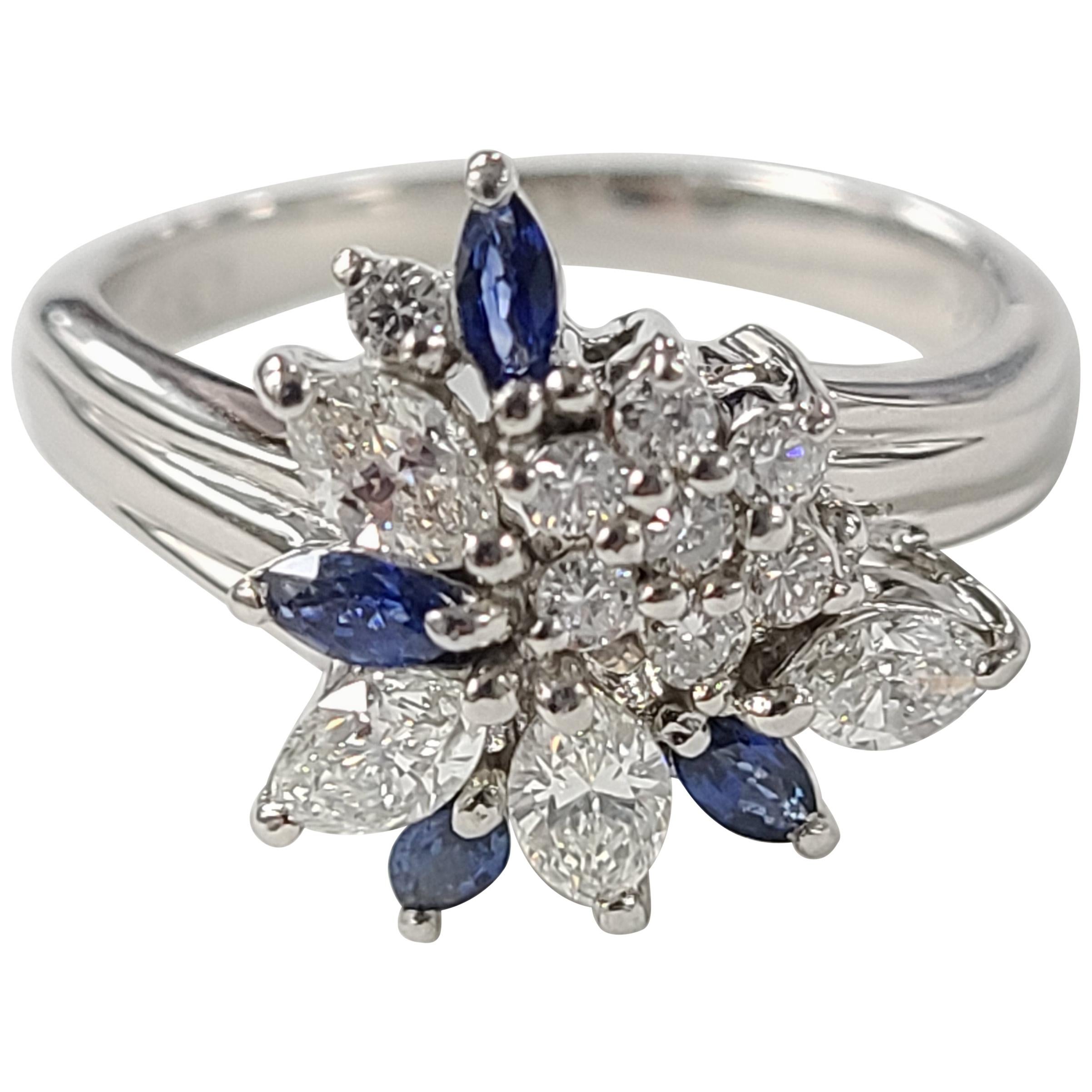 Platinum PT900 Blue Sapphire Ring with Diamonds For Sale