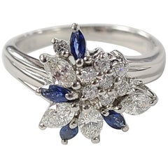 Antique Platinum PT900 Blue Sapphire Ring with Diamonds