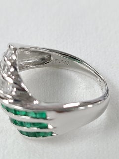 Platinum PT 900 Emerald Ring with Diamonds