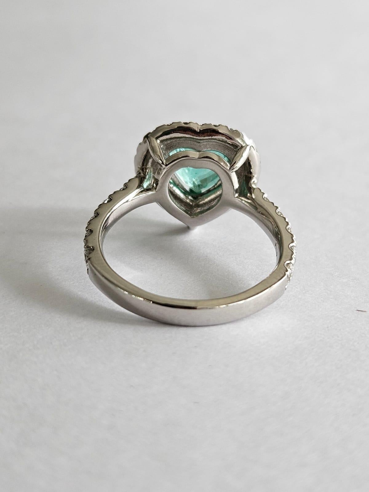 Set in Platinum900, 1.68 carats, Paraiba Tourmaline & Diamonds Engagement Ring For Sale 7