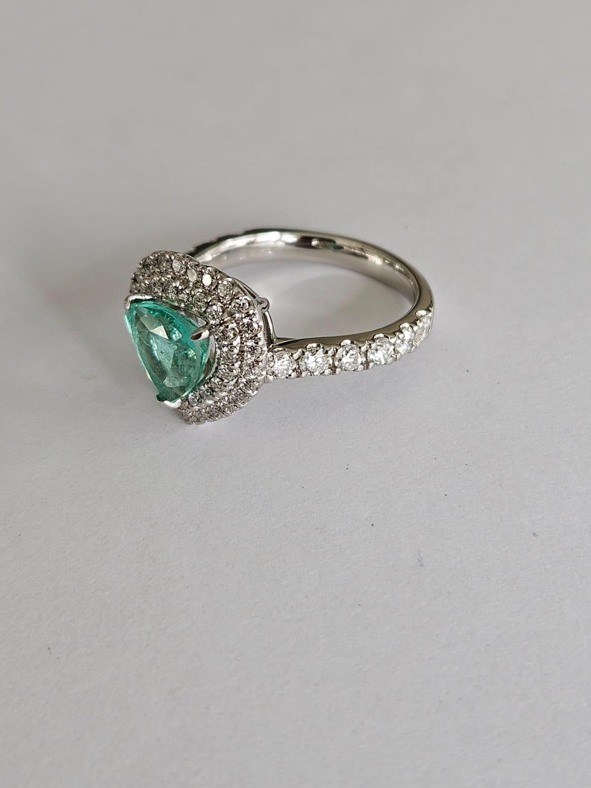 Set in Platinum900, 1.68 carats, Paraiba Tourmaline & Diamonds Engagement Ring For Sale 6