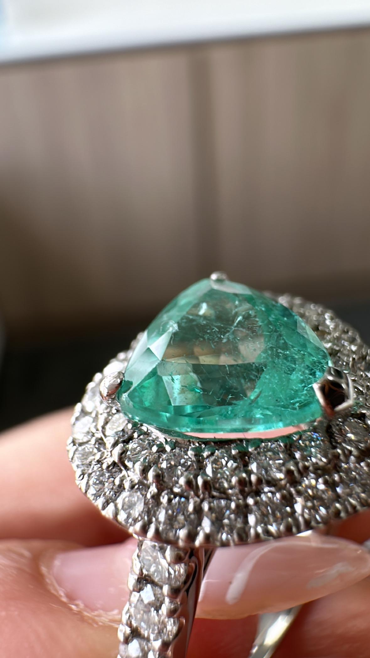 A very beautiful & gorgeous, Paraiba Tourmaline Engagement Ring set in Platinum 900 & natural Diamonds. The weight of the Paraiba Tourmaline is 1.68 carats. The Diamonds weight is 0.98 carats. Net Platinum weight 7.60 grams. The gross weight of the