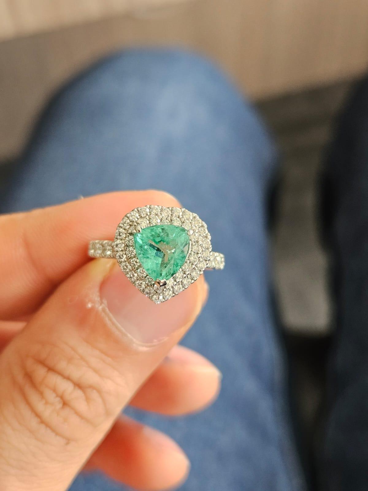 Set in Platinum900, 1.68 carats, Paraiba Tourmaline & Diamonds Engagement Ring For Sale 3
