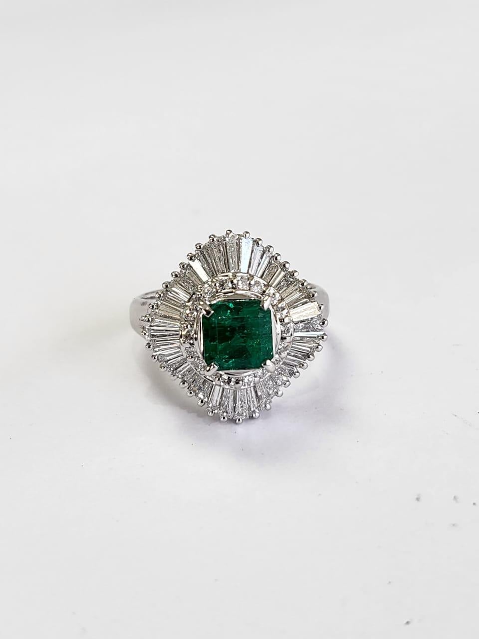 A very gorgeous and beautiful, modern style, Emerald Ring set in Platinum 900 & Diamonds. The weight of the Emerald is 1.09 carats. The Emerald is natural, without any treatment and is of Colombian origin. The Diamonds weight is 1.275 carats. Net