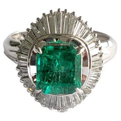 Set in PT900, 1.65 Carats, Natural Columbian Emerald & Diamonds Engagement Ring