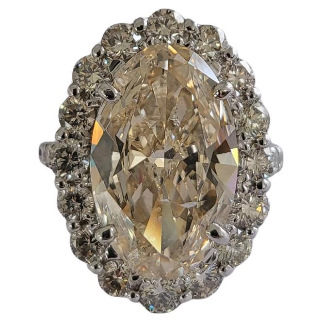 Set in PT900, 6.15 carats, Slight Yellow Brown Oval Diamond Engagement Ring