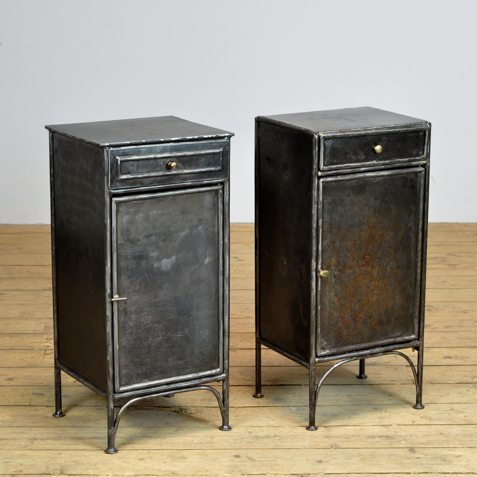 Set of polished hostital bedside table made of iron. Produced in Germany, circa 1910.
There are minor differences in the bedside tables (Size and knobs).

Dimensions left table (H x W x D): 80 x 31 x 36 cm
Dimensions right table (H x W x D): 80
