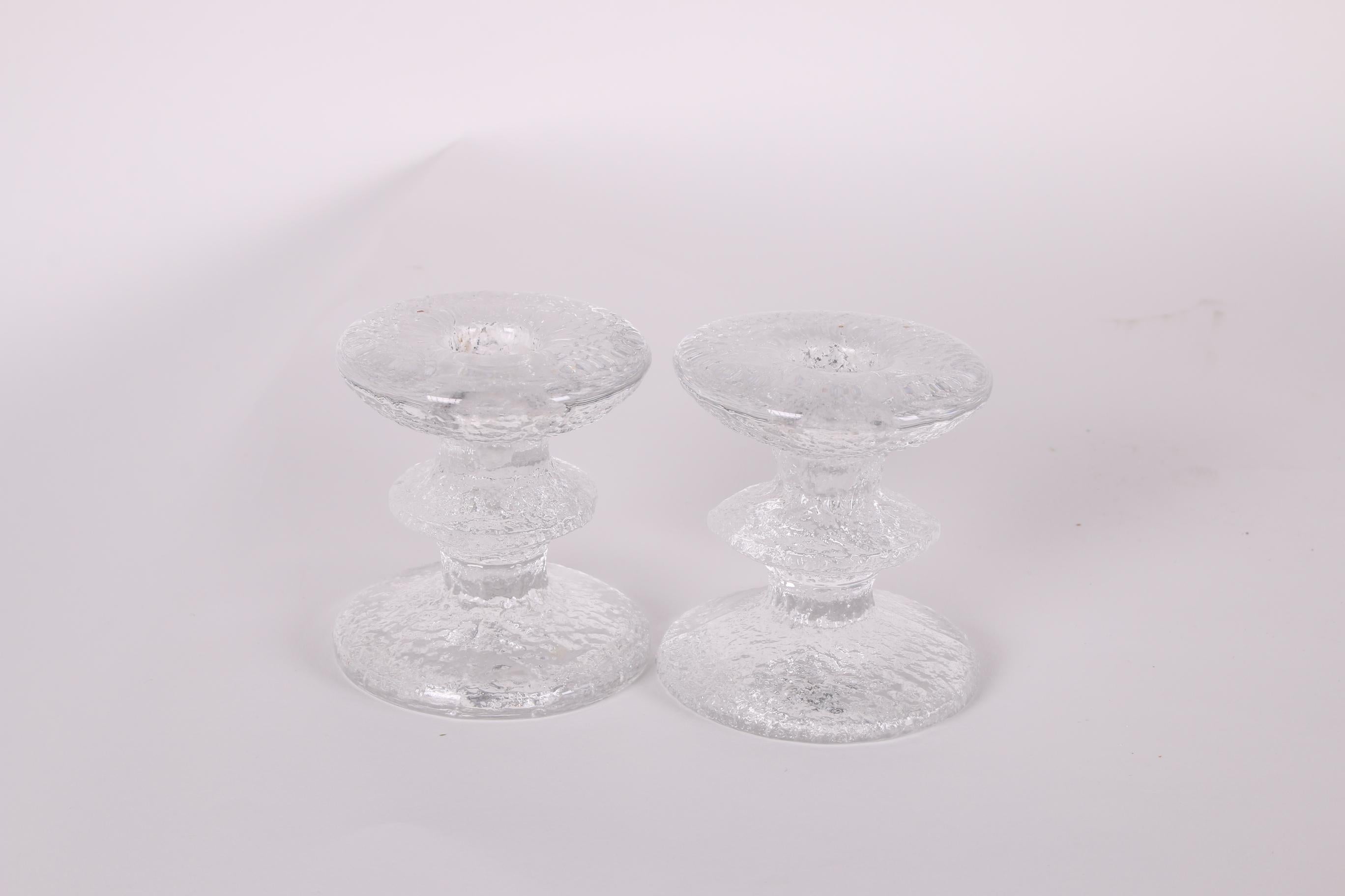 Set Littala Festivo candlesticks design by Timo Sarpaneva


A beautiful glass object from Scandinavia: signed Iittala festivo candlestick/candle holder with 1 ring design by Timo Sarpaneva from 1966. Timo Sarpaneva (1926-2006) was one of the