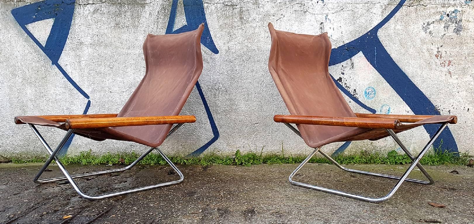 These foldable lounge chairs with canvas seats were designed by Japanese designer Takeshi Nii in 1958 and made by Jox Interni. 
The chair was named 'NY' after the designer's family name which meaning 'new' in Danish.
Canvas can be removed for