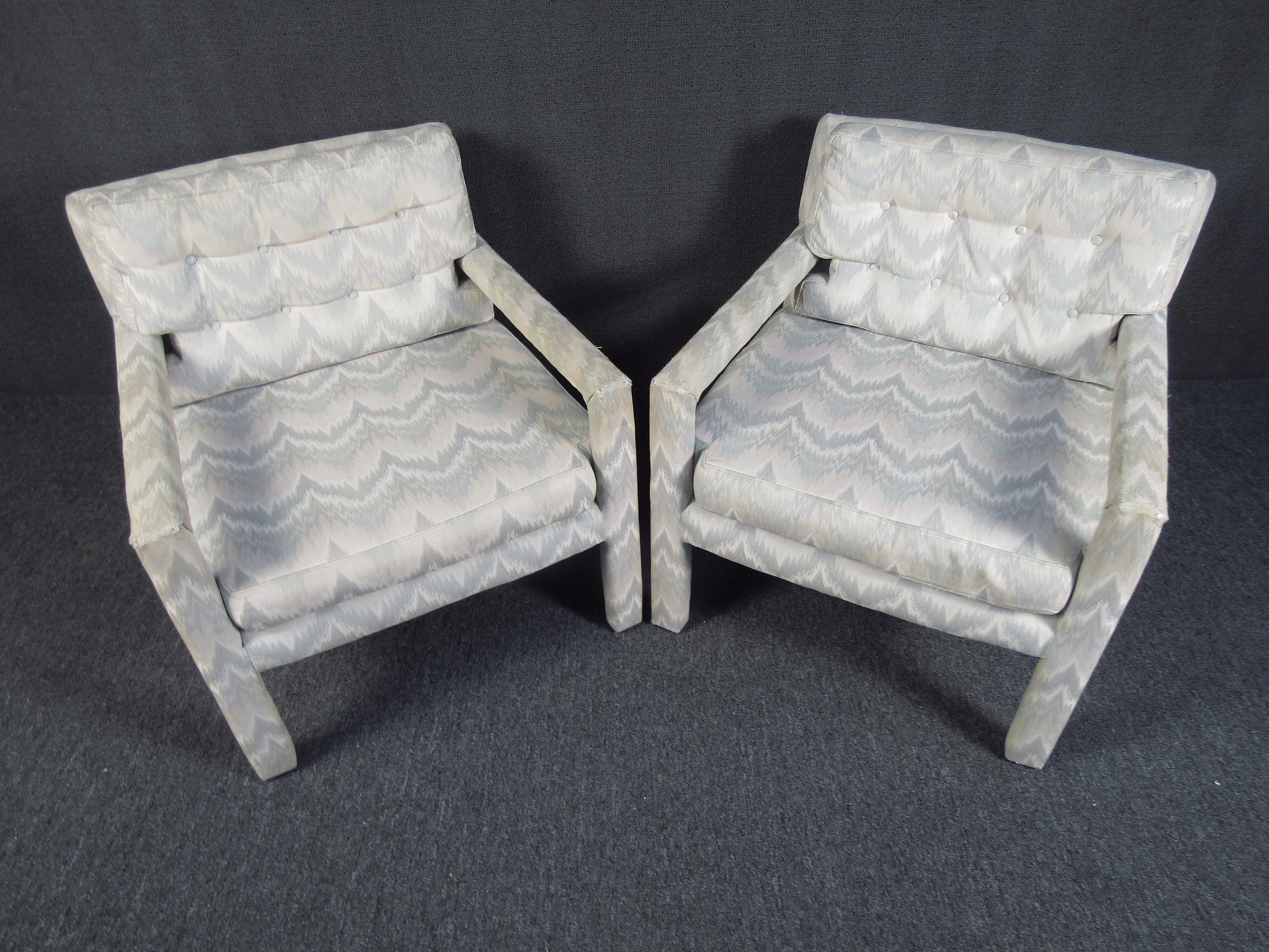 This set of charming armchairs features a completely upholstered frame. This set is perfect for your T.V. or sitting room. Please confirm the item location with the dealer. (NJ/NY).