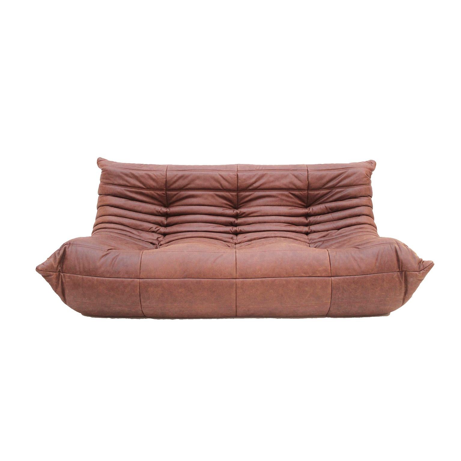 Set mod. Togo designed by Michel Ducaroy for Ligne Roset. Reupholstered in brown leather. France 70's.

Dimensions: W265 x D 190 x H 35 / 70 cm
Double armchair size: W 120 x D 100 x H 35 / 70 cm
Corner sofa: W 100 x D 100 x H 35 / 70 cm (1 item) D