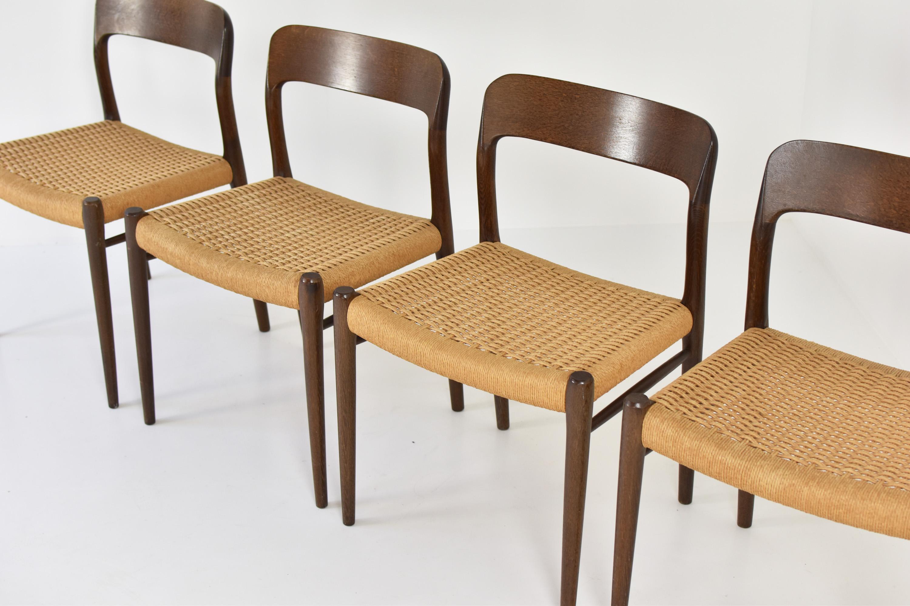 Lovely set of four ‘model 75’ chairs by Niels Otto Møller for J.L.Møllers Mobelfabrik, Denmark, 1960s. This set is made out of solid Wenge with its original papercord seats. These chairs are in very good condition with minor wear consistent with age