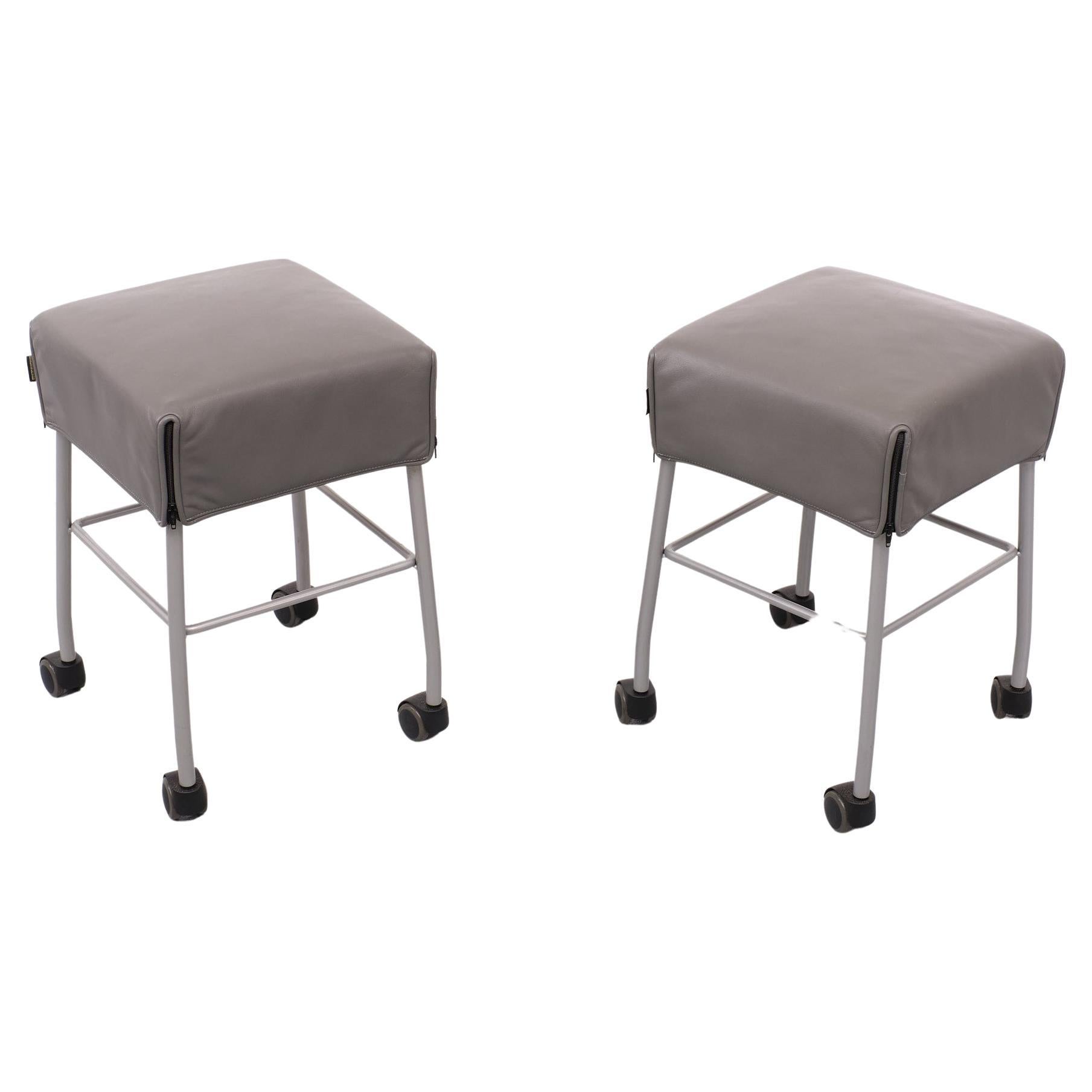 Very nice set of Samba seating stools on wheels . Top quality Grey Leather 
its covering the frame like a coat . Grey Metal Tube frame . 
Manufactured and signed by Montis Dutch quality firm 
footstool or work stool or seating or side table 