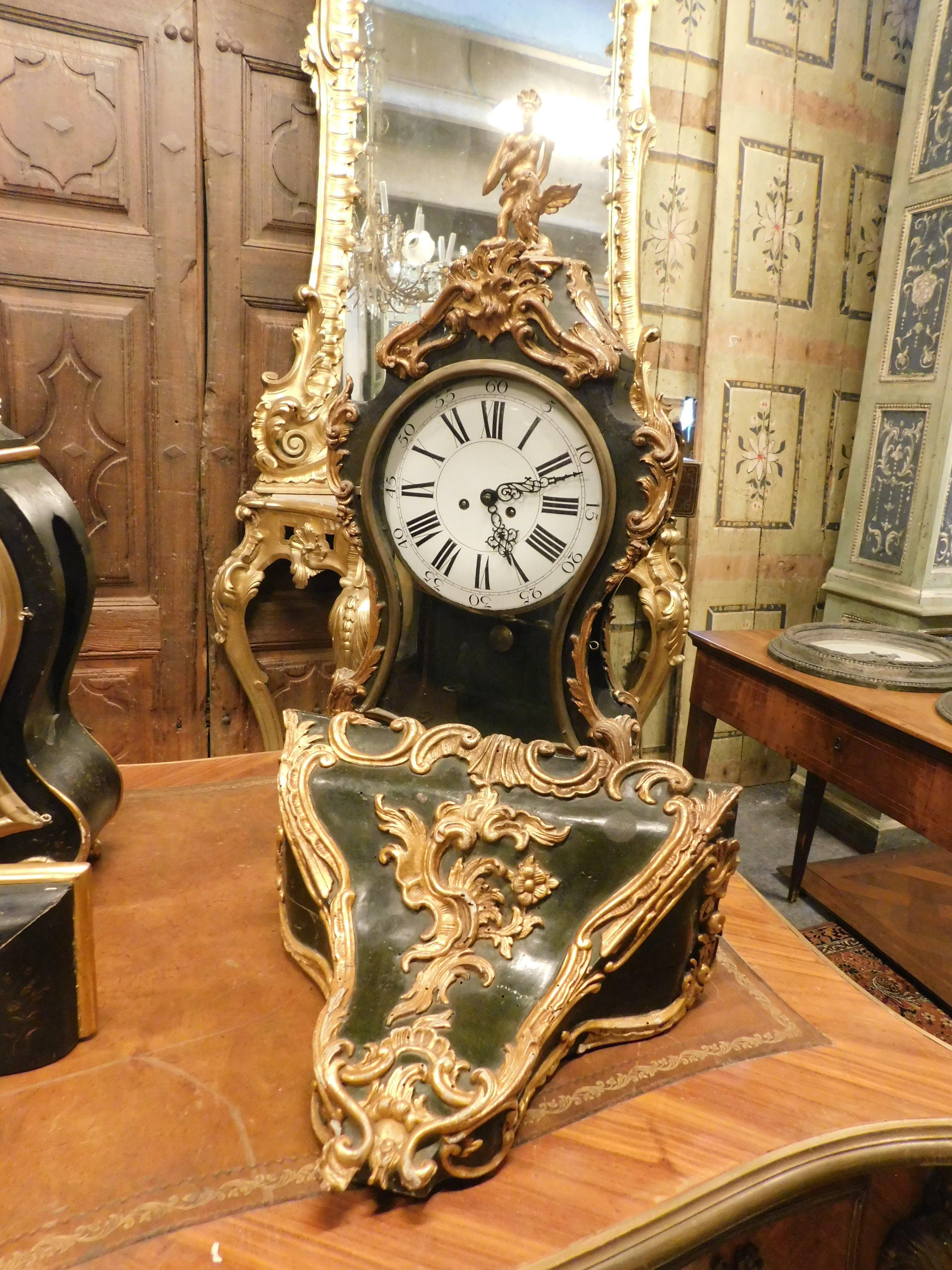 Hand-Carved set n.3 clocks ebonized wood, profiles and feet decorated gilded plant motifs For Sale