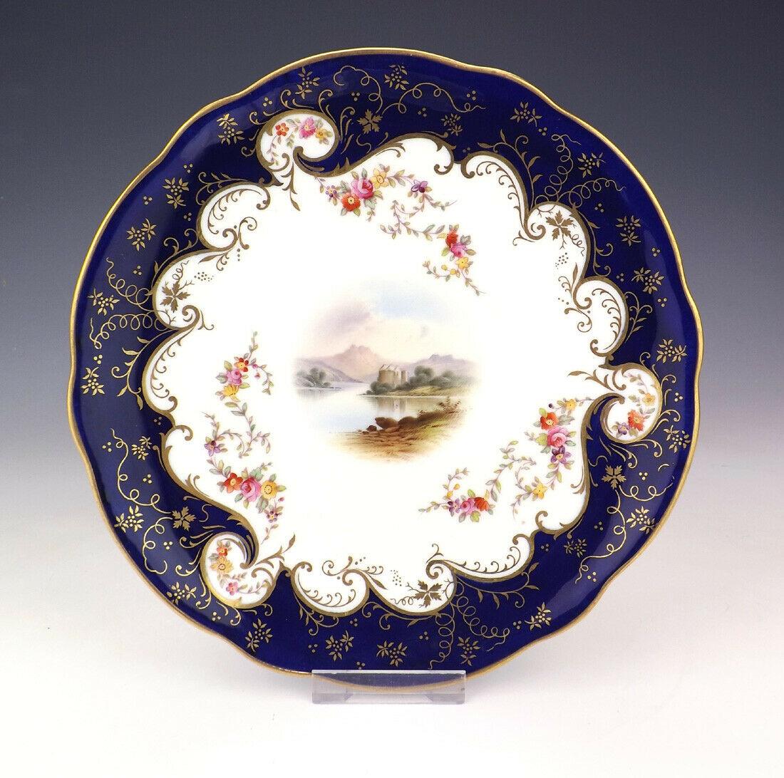 Stunning and rare set of nine Coalport landscape/topographical cabinet plates of outstanding quality, exquisitely hand decorated. Made during the last quarter of the 19th century. 

Each plate with a hand painted landscape central reserve