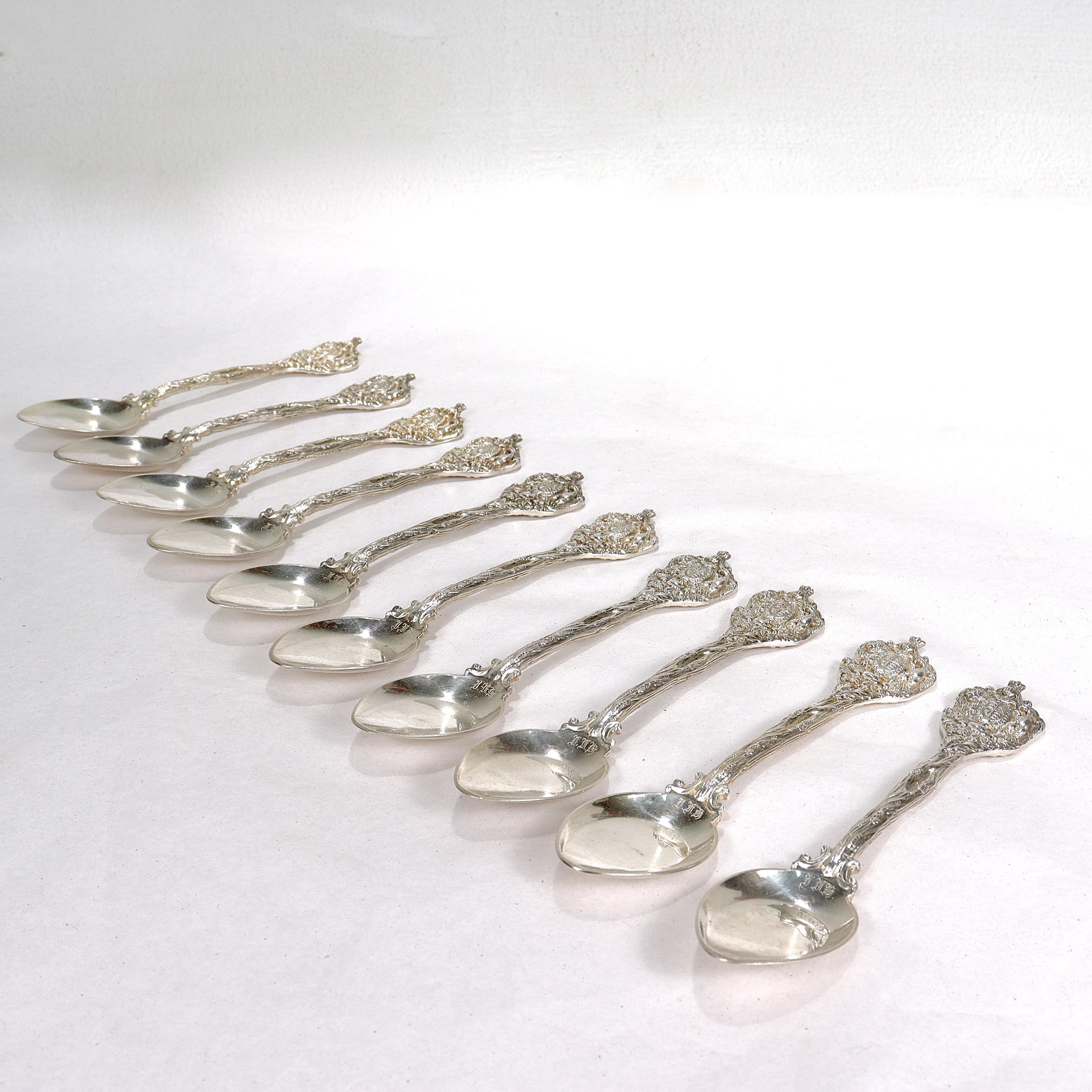 A fine set of antique English silver plated desert spoons or shovels. 

By Elkington & Co.

Each spoon with a shovel shaped bowl, a figural handle in the shape of an oak branch with acorns and oak leaves, and a finial in the shape of the English