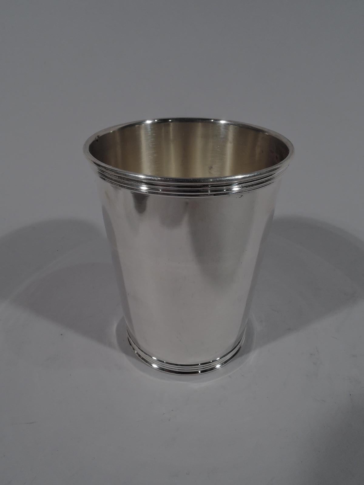 Set of 10 sterling silver mint julep cups. Made by Manchester in Providence. Each straight and tapering sides, and reeded rim and base. Fully marked. Six cups numbered 3759 and 4 cups numbered 3759S. Total weight: 40.5 troy ounces.