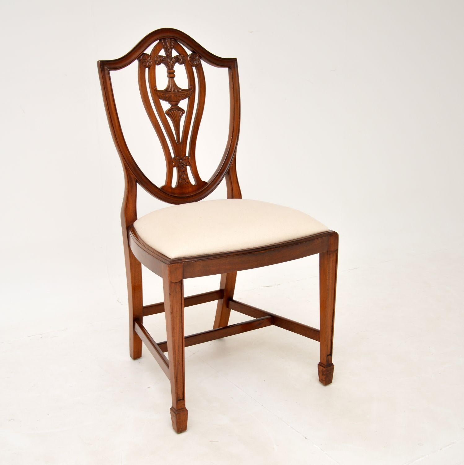 An excellent set of ten solid shield back dining chairs in the antique Georgian Adam style. These were made in England, they date from around the 1930-1950’s.

The quality is superb, these are beautifully crafted and designed. There is beautiful