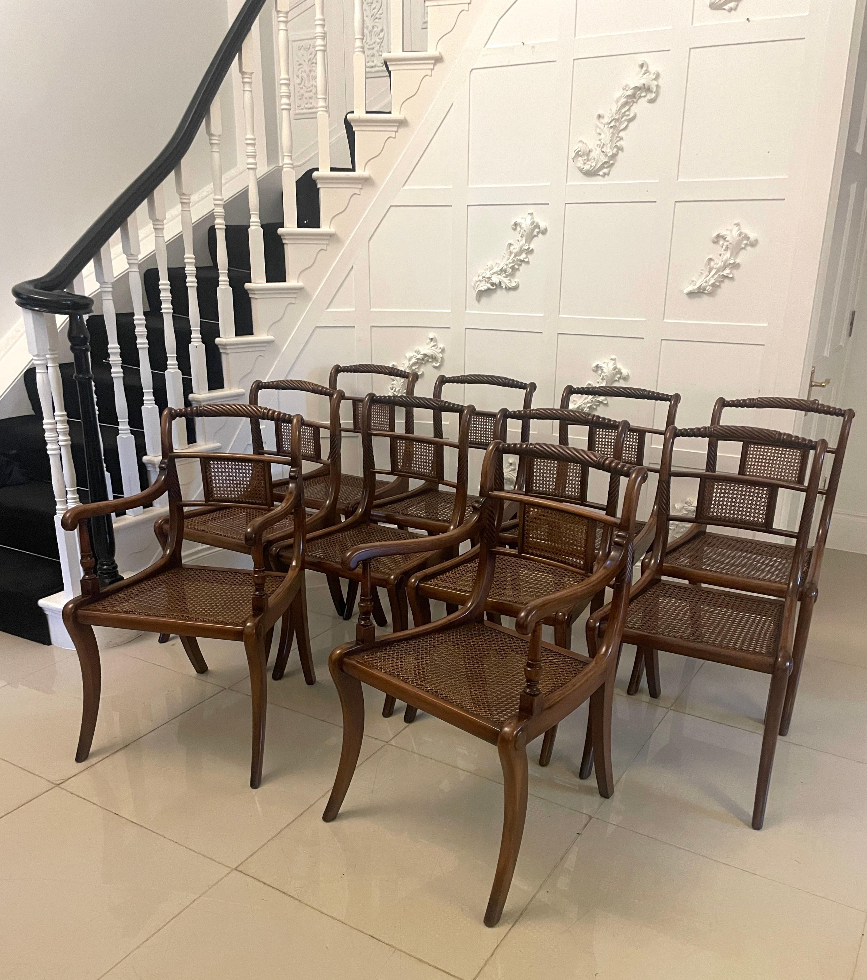 Set of 10 antique Edwardian quality mahogany and cane dining chairs consisting of two elbow chairs and eight single chairs having a quality mahogany rope twist top above two rails with a cane panel the elbow chairs having a shaped scrolled open arm