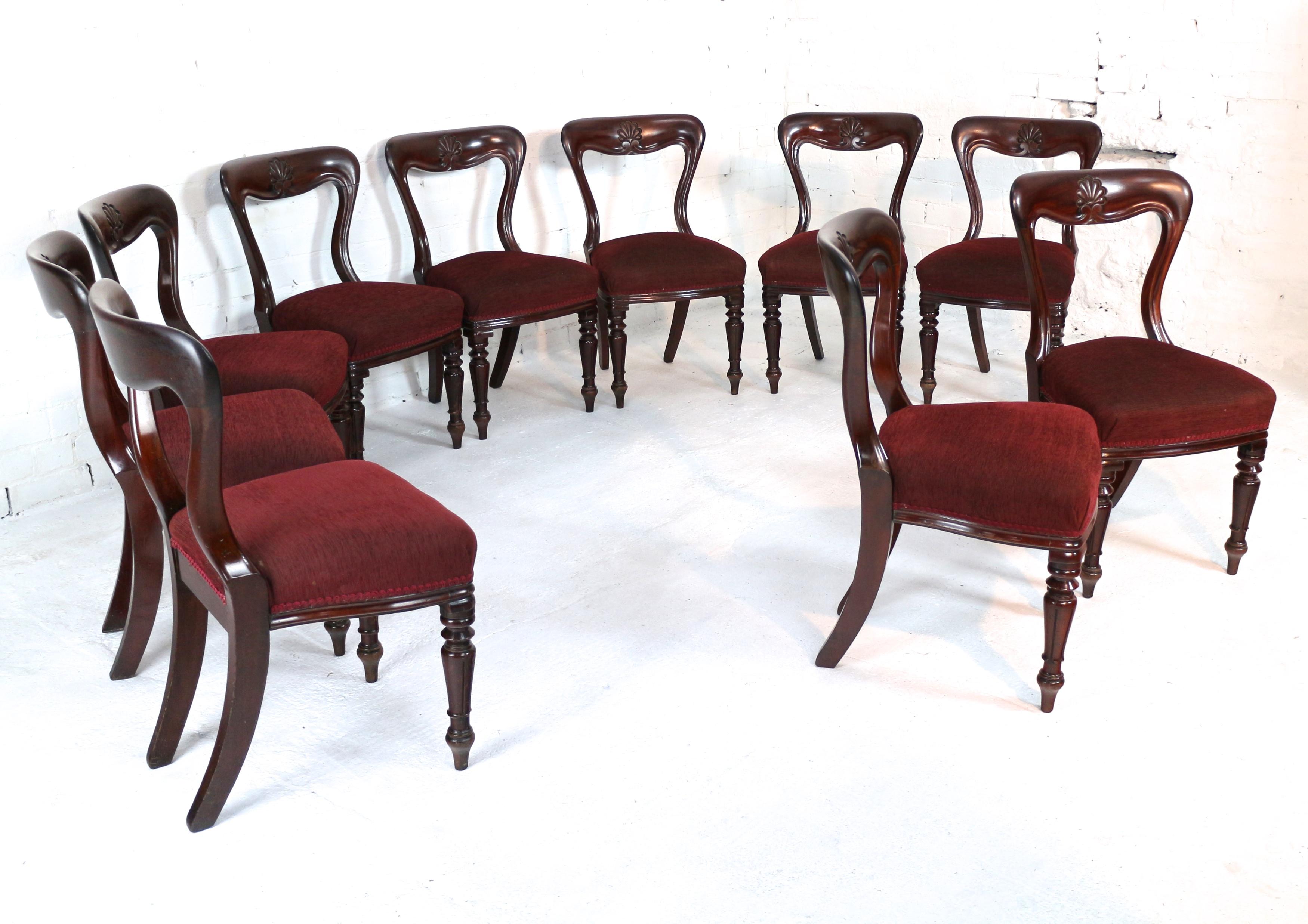 A fantastic set of ten William IV mahogany dining chairs dating to circa 1830 and by J Proctor. Made from the best quality dense and finely figured mahogany these are heavier than standard chairs of this model, the waisted balloon back with a deep