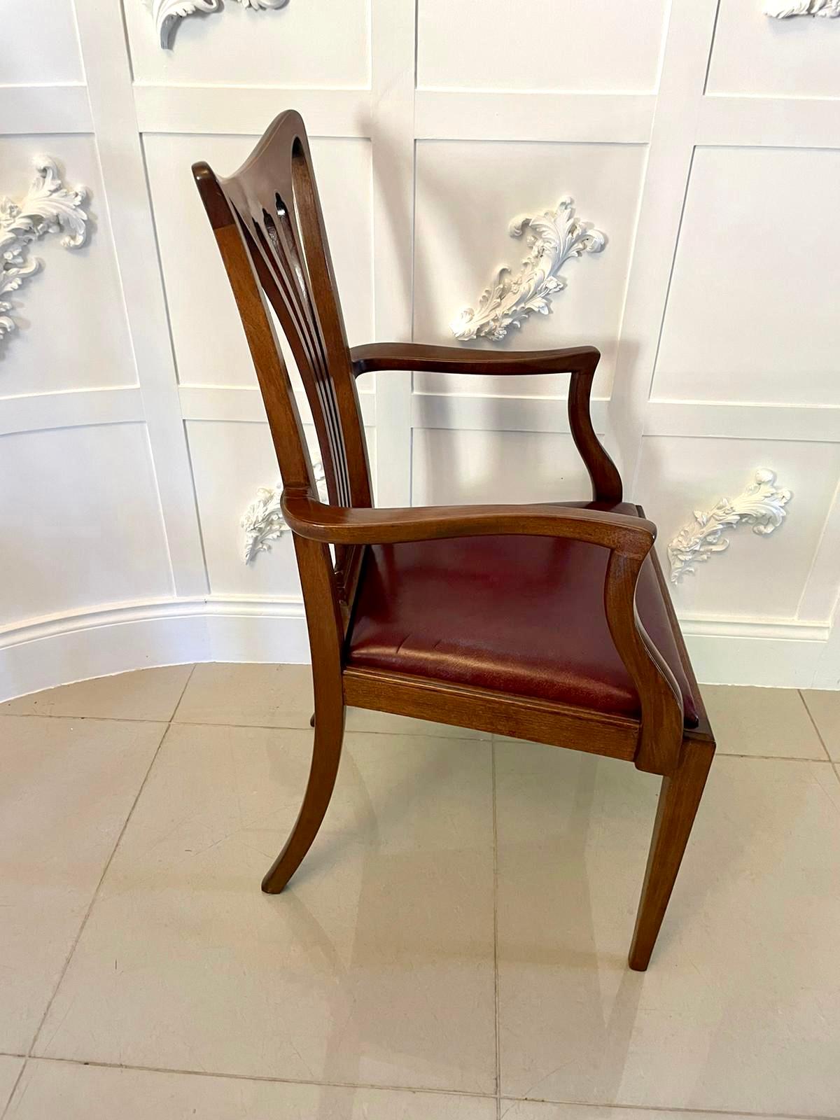 Set of 10 antique Victorian quality mahogany inlaid dining chairs consisting of 2 elbow chairs and 8 single chairs having a quality mahogany shaped top rail, shaped pierced splat to the centre of the back with inlaid satinwood stringing, the elbow