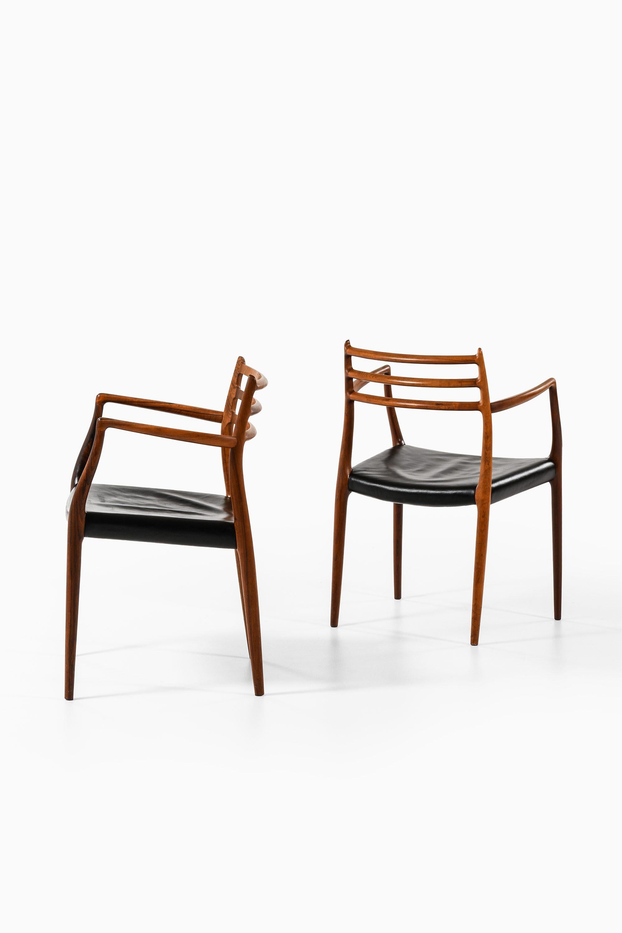 Set of 10 Armchairs in Rosewood and Black Leather by Niels Otto Møller, 1960's For Sale 1