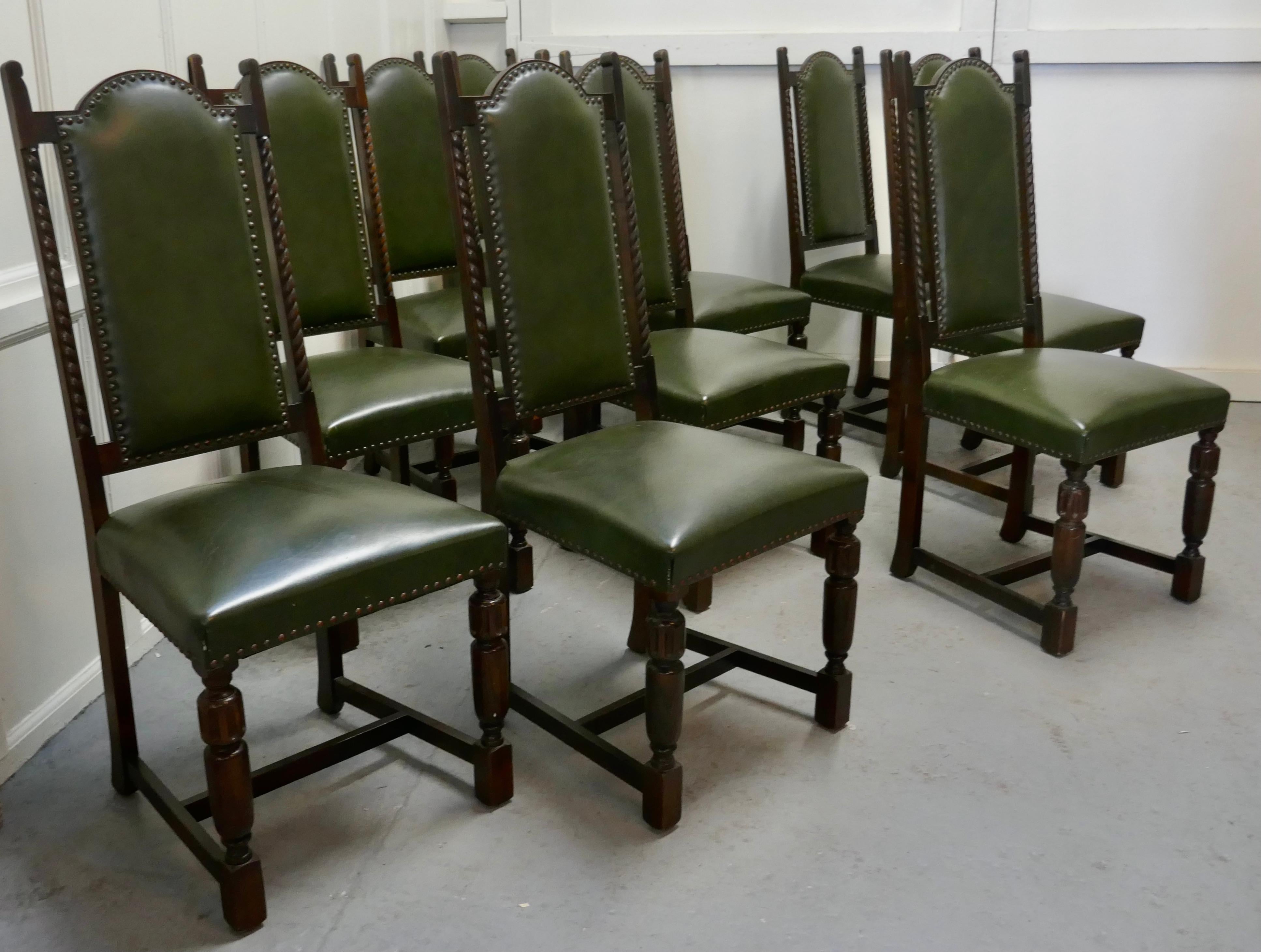 Set of 10 Arts & Crafts oak and leather dining chairs
 
This is a superb quality set of high back dining chairs, they are made in Oak and upholstered in soft bottle green leather hide
The chairs have a high arched shaped back with a rope carved