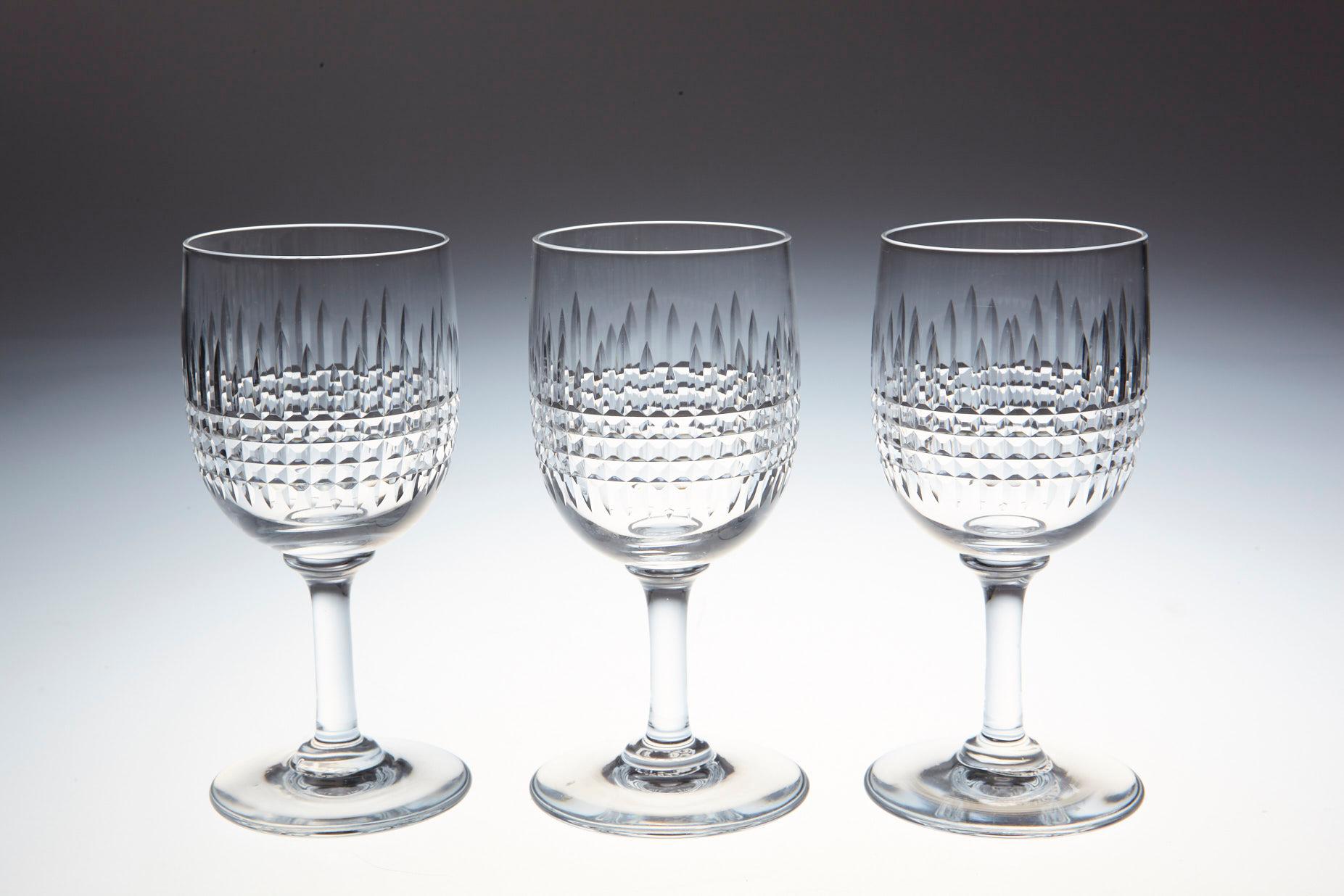 Rare set of 10 Baccarat crystal sherry glasses in the 'Nancy' pattern.
This classical shape with finely banded vertical and horizontal cuttings is one of Baccarat Crystal,'s most popular patterns, first created in 1909 but is discontinued