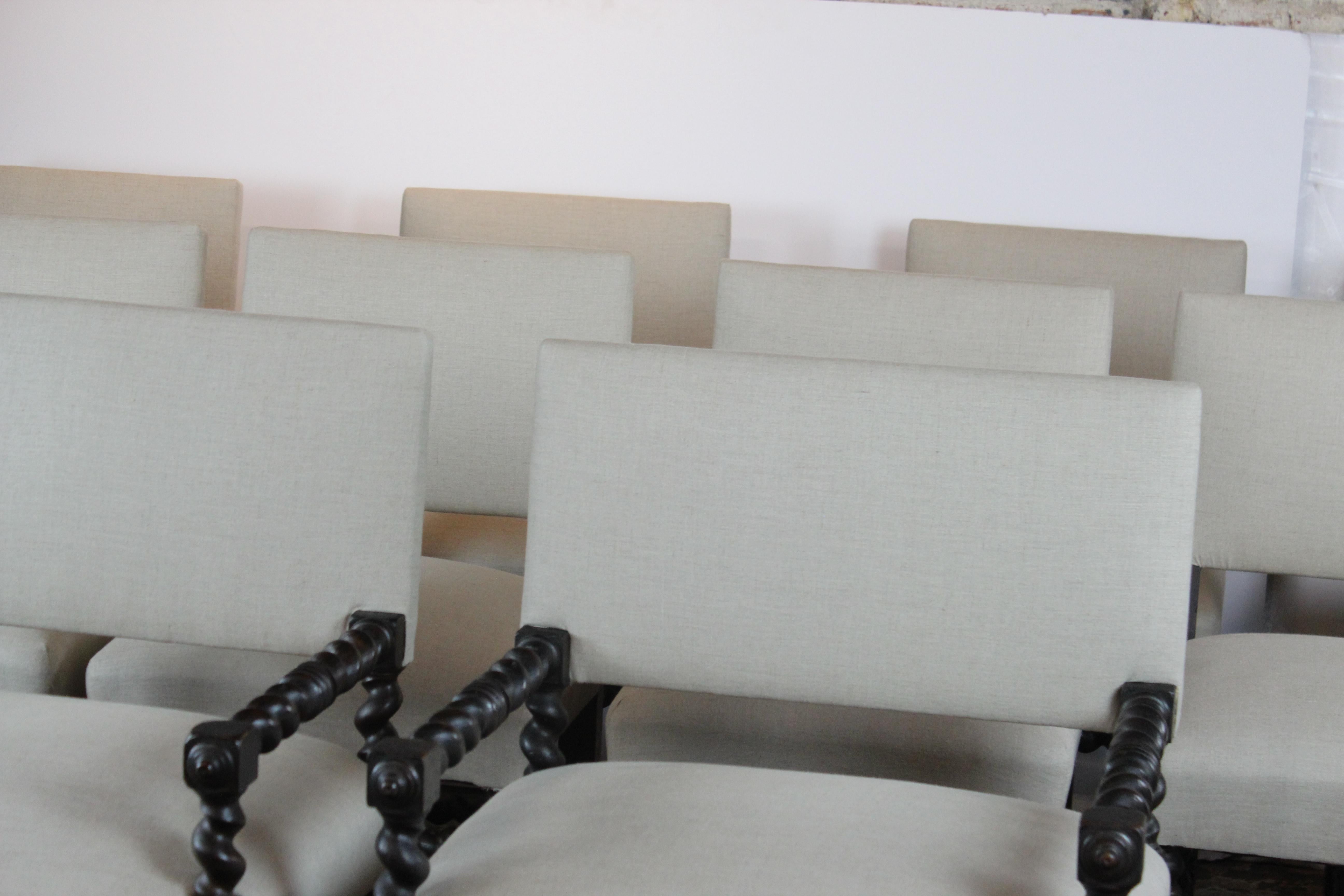 English barley twist dining chairs. Upholstered in linen. Measures: The armchairs 24