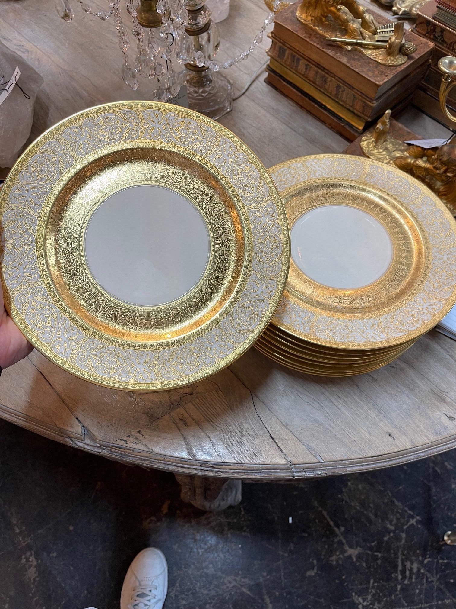 Lovely set of 10 Bavarian china gold encrusted dinner plates by Heinrich & Company. A very impressive set! Superb!.