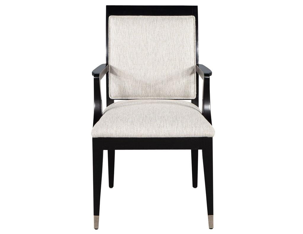 Set of 10 Black Lacquered modern dining chairs by Jay Spectre. Solid wood frames finished in a satin black lacquer with beautiful, visible wood grain details. Upholstered in a textured off-white linen with dark undertone details. Completed with