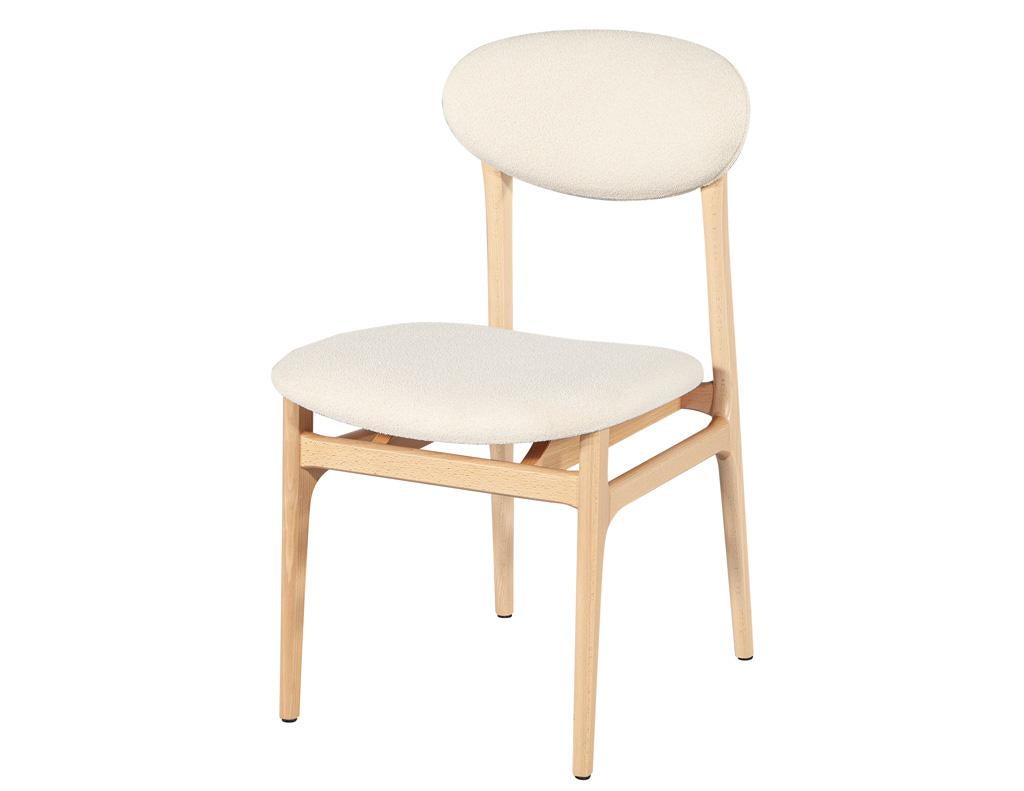Modern Set of 10 Carrocel Hendrick Dining Chairs in Natural Finish with Boucle Fabric For Sale