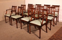 Set Of 10 Chairs And Two Armchairs In Mahogany, Hepplewhite Style
