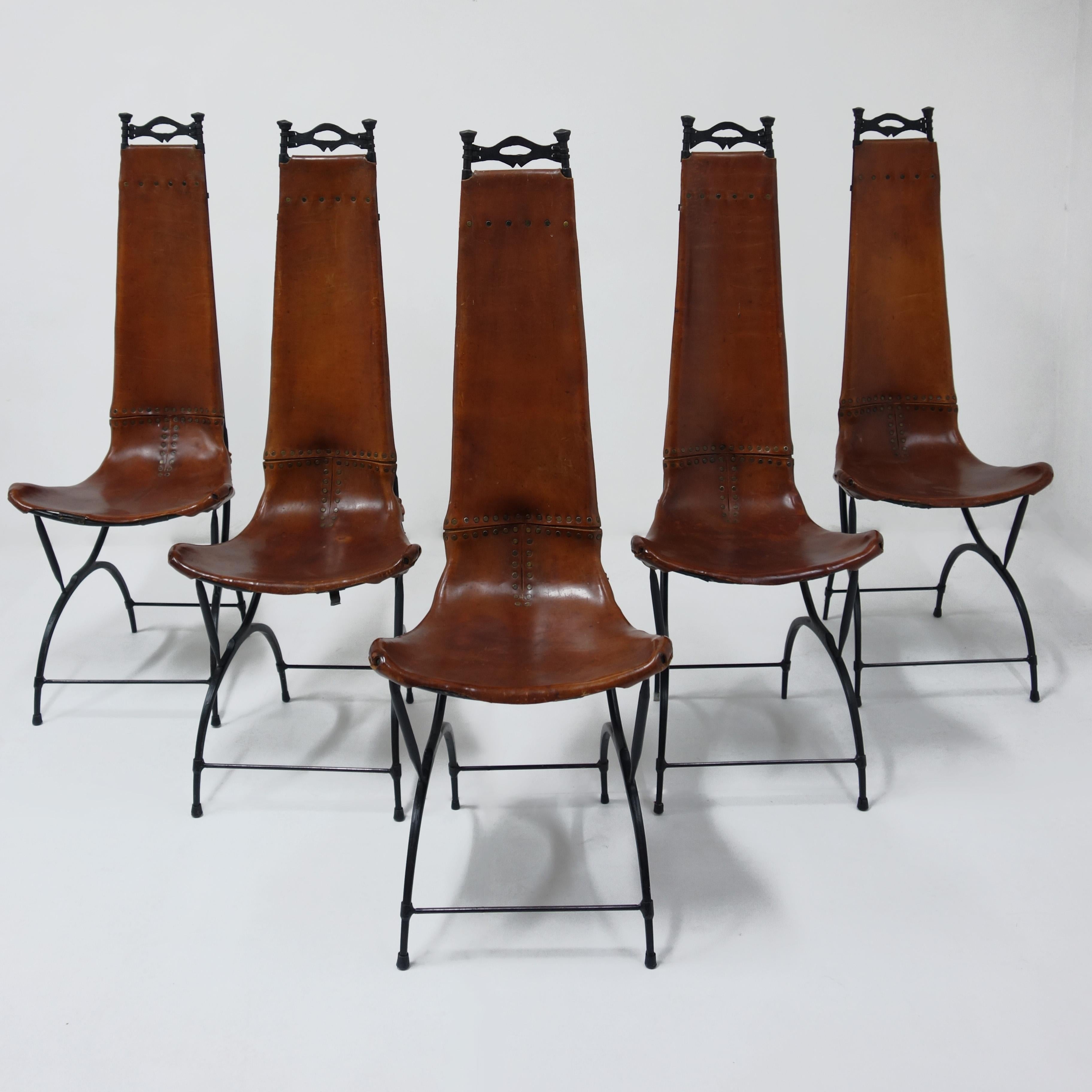 Set of 10 chairs by François & Sido Thevenin in black wrought iron structure and brown patina leather.
François and Sido Thevenin give life to metal thanks to their great mastery of forging. Legs forming a lateral arcature. Cut-out metal ornaments