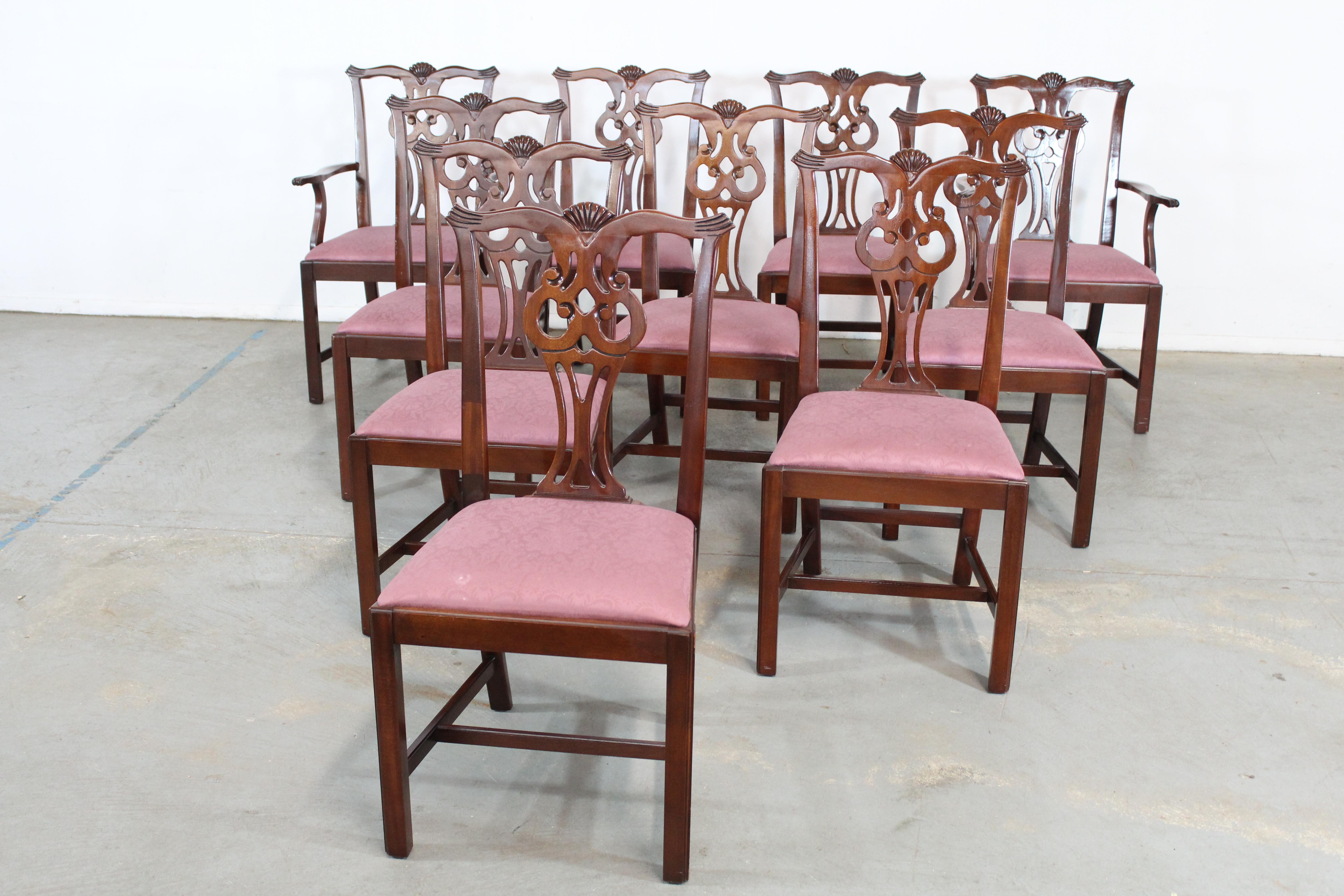 Set of 10 Chippendale solid mahogany dining side chairs by Century Furniture
Offered is a set of 10 Chippendale solid mahogany dining side chairs by Century Furniture. They are made of solid mahogany wood and have upholstered seats. In good