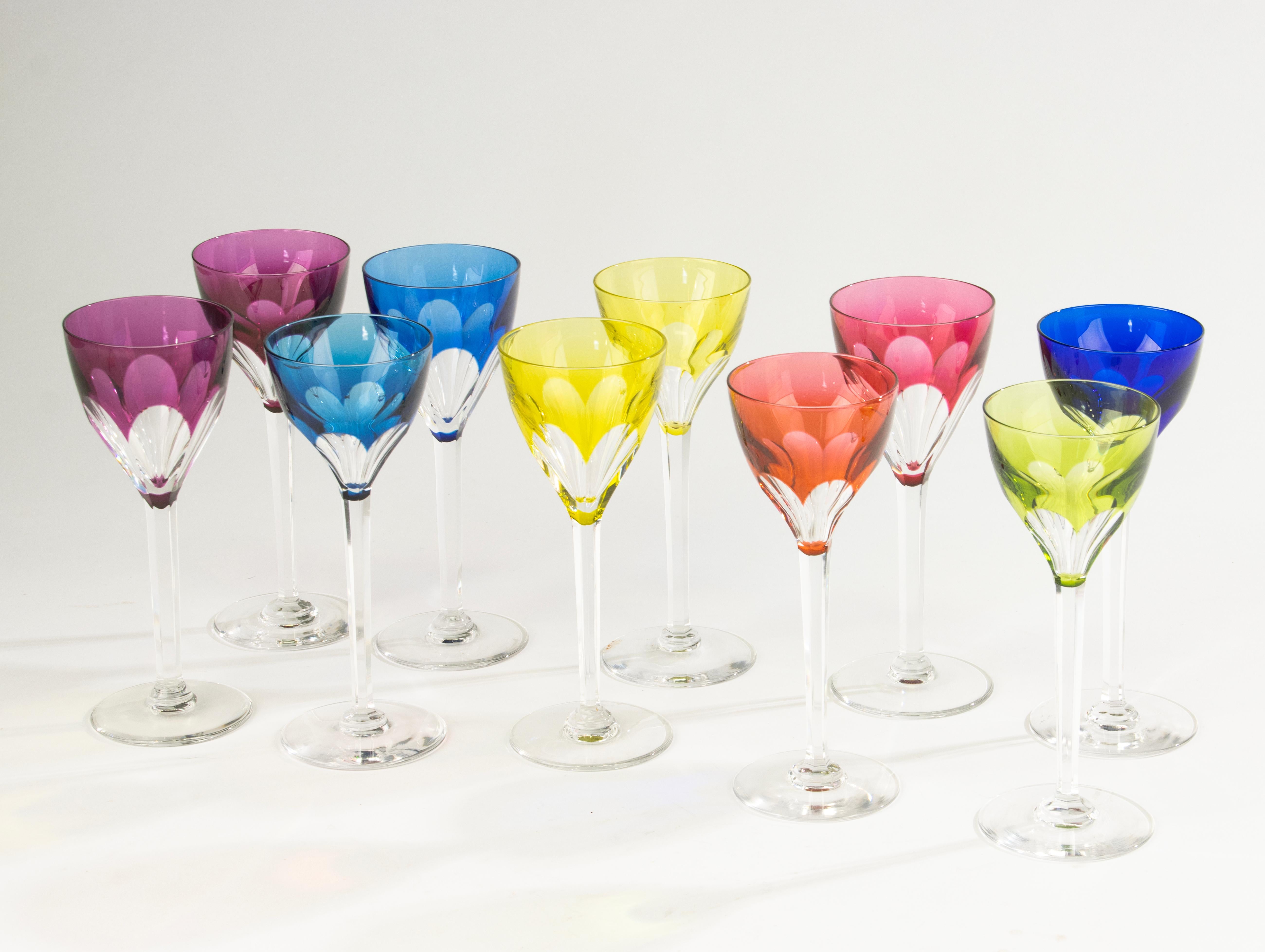 Elegant set of 10 crystal wine glasses, model Gevaert. Each glass is beautifully executed in vibrant cut-to-clear crystal, featuring a variety of colors including blue, green, yellow, pink, purple, and red.
These glasses are finely crafted with a