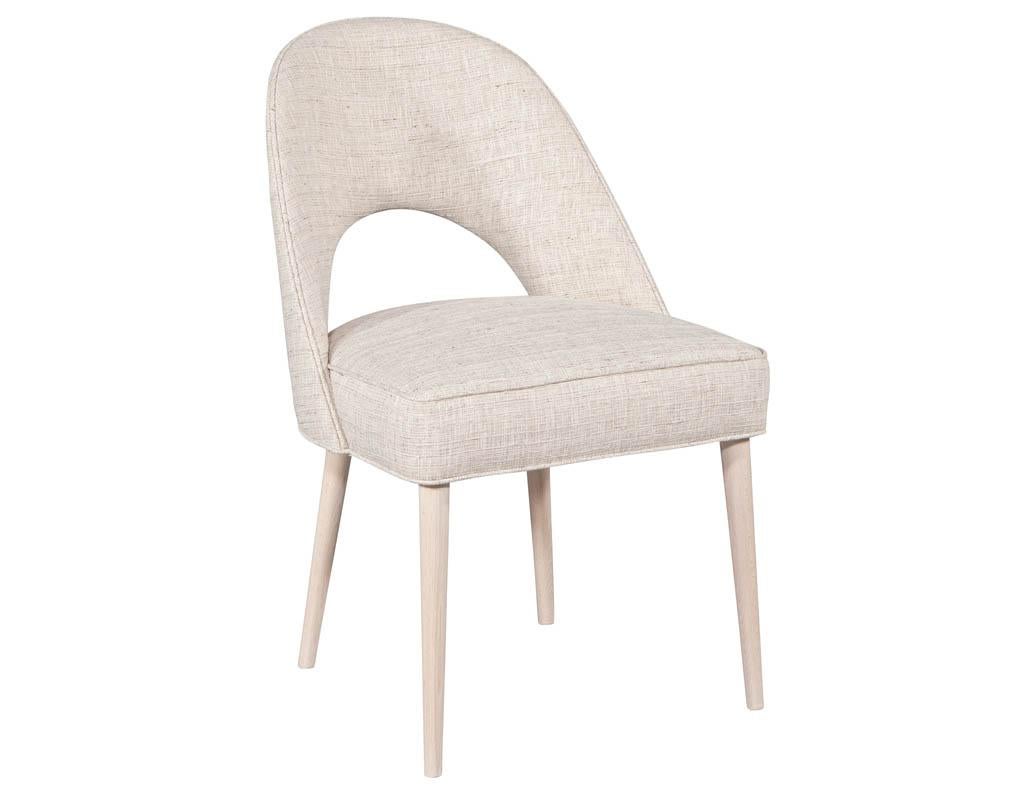 Set of 10 Moderno custom dining chairs. Upholstered in Fabricut Granite Tweed Ash finished in a custom glazier whitewash finish.

Price includes complimentary curb side delivery to the continental USA.